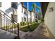 Walkway and stairs leading to condo building at 129 Preserve Pl # A, Nokomis, FL 34275