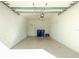 Attached garage with ample storage space and overhead door at 129 Preserve Pl # A, Nokomis, FL 34275