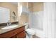 Clean bathroom with granite countertop and shower/tub combo at 13489 Abercrombie Dr, Englewood, FL 34223