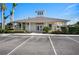 Community clubhouse with ample parking at 13489 Abercrombie Dr, Englewood, FL 34223