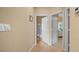 Hallway with access to bedrooms and bathrooms at 13489 Abercrombie Dr, Englewood, FL 34223