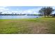 Expansive lake view in a tranquil waterfront community at 13489 Abercrombie Dr, Englewood, FL 34223