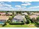 Aerial view of houses with pools in a residential area at 13760 Long Lake Ln, Port Charlotte, FL 33953