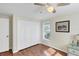 Bedroom with double door closet and window at 142 Caddy Rd, Rotonda West, FL 33947