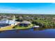 Bird's eye view of home, pool, and private dock on the canal at 14201 Joggins Ave, Port Charlotte, FL 33981