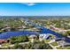 Aerial perspective of a waterfront community at 14201 Joggins Ave, Port Charlotte, FL 33981