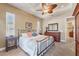 Main bedroom with plush carpet and en-suite bathroom at 14201 Joggins Ave, Port Charlotte, FL 33981