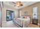 King-size bedroom with sliding glass doors leading to the patio at 14201 Joggins Ave, Port Charlotte, FL 33981