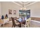 Elegant dining room with large window and hardwood floors at 14201 Joggins Ave, Port Charlotte, FL 33981