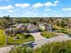 Aerial view of a single Gathering home with a large lot at 14216 Aurella Cir, Port Charlotte, FL 33981