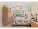 Large bedroom with king-size bed and built-in wardrobe at 14216 Aurella Cir, Port Charlotte, FL 33981