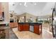 Kitchen boasts a large island and ample cabinet space at 14216 Aurella Cir, Port Charlotte, FL 33981