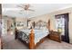 Main bedroom with a king bed and plenty of natural light at 14216 Aurella Cir, Port Charlotte, FL 33981