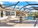 Enclosed pool and spa with view into home at 14216 Aurella Cir, Port Charlotte, FL 33981