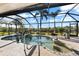 Stunning screened pool and spa with tranquil views at 14216 Aurella Cir, Port Charlotte, FL 33981