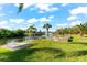 Firepit and seating area overlooking canal at 14216 Aurella Cir, Port Charlotte, FL 33981