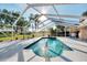 Bask in the sun by the screened in-ground pool, perfect for swimming and recreation at 1443 Quail Lake Dr, Venice, FL 34293