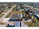 Aerial view showcasing house, pool, and neighborhood at 1521 Saint Clair Rd, Englewood, FL 34223