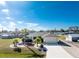 Aerial view of single-story home with landscaped yard and driveway at 1521 Saint Clair Rd, Englewood, FL 34223