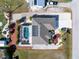 Aerial view of single-Gathering home with pool and landscaped yard at 1521 Saint Clair Rd, Englewood, FL 34223