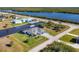 Aerial view of home with private dock access at 15410 Seafoam Cir, Port Charlotte, FL 33981