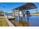 Covered boat lift with access to waterway at 15410 Seafoam Cir, Port Charlotte, FL 33981