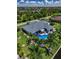 Bird's-eye view of home, pool, and canal at 15794 Viscount Cir, Port Charlotte, FL 33981