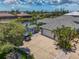 House with driveway, landscaping, and canal access at 15794 Viscount Cir, Port Charlotte, FL 33981