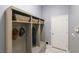 Laundry room with cubbies and built-in storage at 15794 Viscount Cir, Port Charlotte, FL 33981