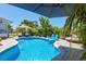 Stunning pool area with multiple lounge options at 15794 Viscount Cir, Port Charlotte, FL 33981