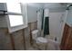 Unfinished bathroom with shower and toilet at 1755 Georgia Ne Ave, St Petersburg, FL 33703