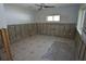 Unfinished bedroom with tiled floor and exposed walls at 1755 Georgia Ne Ave, St Petersburg, FL 33703