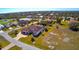 Aerial view of house and neighborhood, showcasing location and landscape at 2 Windward Rd, Placida, FL 33946