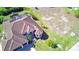 Aerial view of single-Gathering home with tile roof and large lot at 2 Windward Rd, Placida, FL 33946