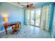 Bright office with pool view, hardwood floors and built-in desk at 2 Windward Rd, Placida, FL 33946