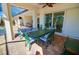 Outdoor dining area with pool view at 2 Windward Rd, Placida, FL 33946