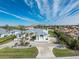 Single-Gathering home with metal roof, landscaping and large driveway offering water views at 210 Capstan Dr, Placida, FL 33946