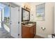 Bathroom with granite vanity and water view at 210 Capstan Dr, Placida, FL 33946