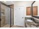 Clean bathroom with a large walk-in shower and single vanity at 210 Capstan Dr, Placida, FL 33946