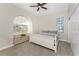 Spacious bedroom with a king-size bed and large window at 210 Capstan Dr, Placida, FL 33946