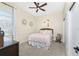 Charming bedroom with a queen-size bed and decorative wall art at 210 Capstan Dr, Placida, FL 33946