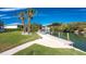 Private dock with covered boat lifts at 210 Capstan Dr, Placida, FL 33946