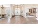 Elegant entryway with high ceilings and a chandelier at 210 Capstan Dr, Placida, FL 33946