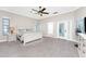 Spacious main bedroom with a ceiling fan and large windows at 210 Capstan Dr, Placida, FL 33946