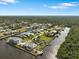 Bird's-eye view of waterfront community and homes at 2295 Chilcote Ter, Port Charlotte, FL 33981