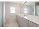 Bathroom with double sinks and updated vanity at 2295 Chilcote Ter, Port Charlotte, FL 33981