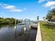 Spacious boat dock with lift and serene water views at 2295 Chilcote Ter, Port Charlotte, FL 33981