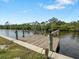 Private wooden boat dock perfect for enjoying waterfront living at 2295 Chilcote Ter, Port Charlotte, FL 33981