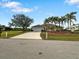 One-story house with a two-car garage and nicely landscaped yard at 2295 Chilcote Ter, Port Charlotte, FL 33981