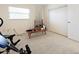 Versatile spare bedroom with fishing rod storage and exercise equipment at 2295 Chilcote Ter, Port Charlotte, FL 33981